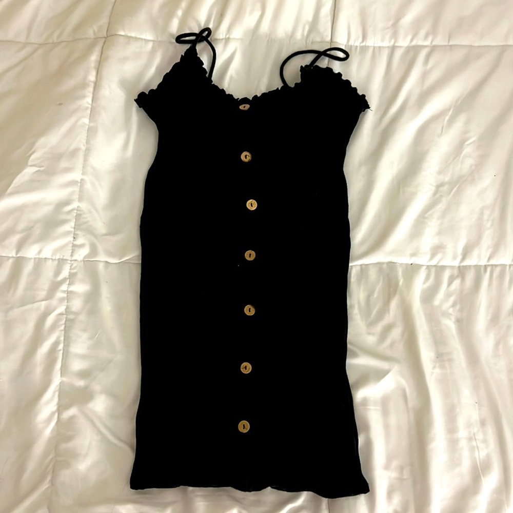 Black button body on dress size medium adult.